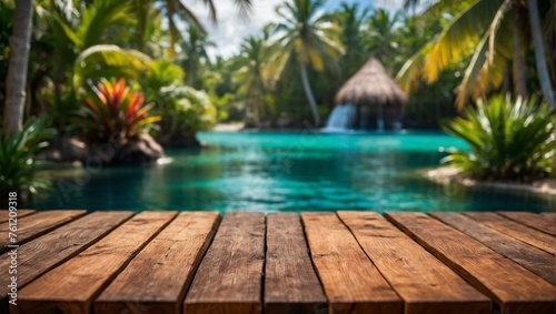 A picturesque wooden deck overlooking a tropical haven with a thatched-roof hut and lush foliage