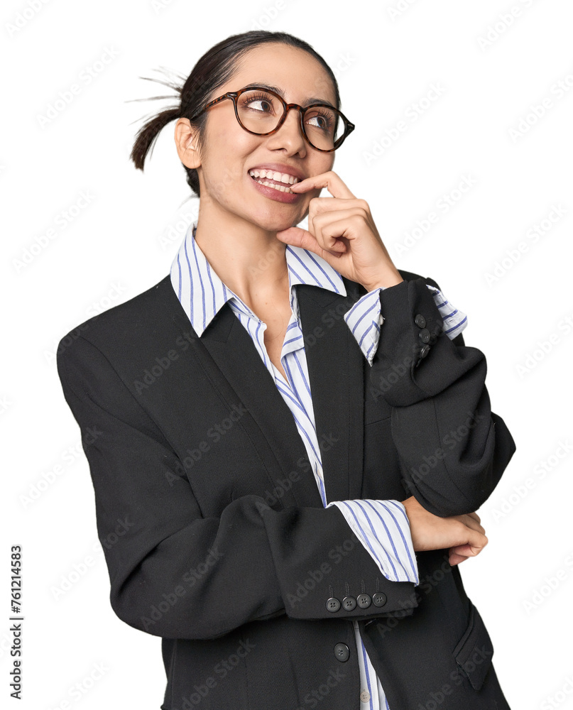 Confident young Caucasian businesswoman on studio background relaxed thinking about something looking at a copy space. Confident young Caucasian businesswoman on studio background relaxed thinking about something looking at a copy space.