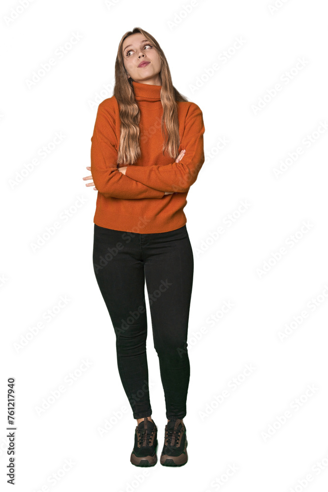 Studio portrait of a blonde Caucasian woman dreaming of achieving goals and purposes Studio portrait of a blonde Caucasian woman dreaming of achieving goals and purposes