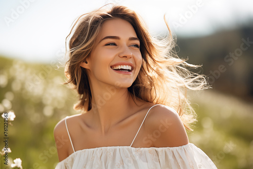 happy young woman in white soft dress looking away smile in spring field  
