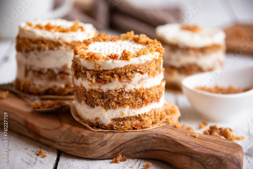 Small carrot cakes on white background