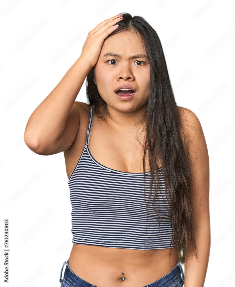 Young Chinese woman in gray top, studio being shocked, she has remembered important meeting. Young Chinese woman in gray top, studio being shocked, she has remembered important meeting.