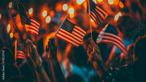 A diverse crowd of people waving American flags in unison at a public gathering, expressing unity and pride in their country. Rallies. Protests. A group of voters. Banner. Copy space photo