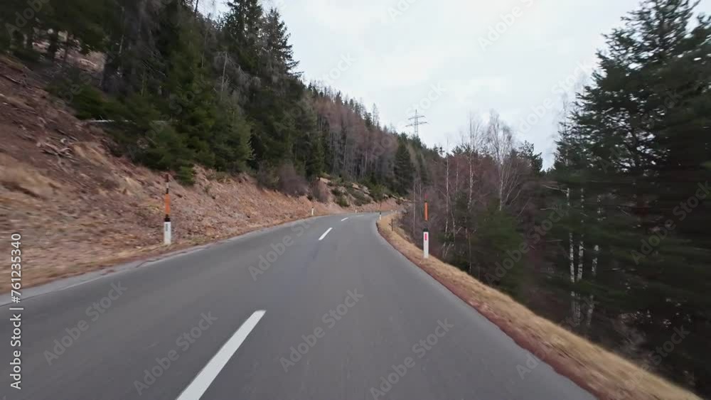 Dash Cam POV Car Driving Down Asphalt Road Through Austrian Alps Valley on Cloudy Day Dash Cam POV Car Driving Down Asphalt Road Through Austrian Alps Valley on Cloudy Day