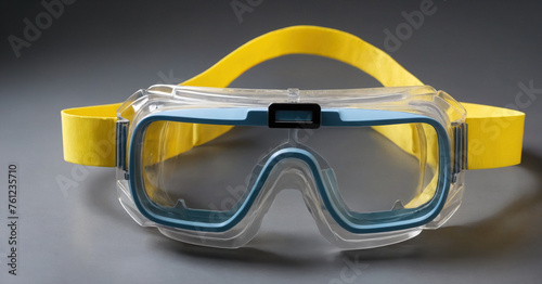 Protective goggles on white background, essential for safety in lab work and construction.