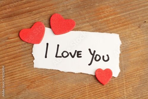 I Love You Phrase Write Piece Paper With Three Red Hearts Wooden Table