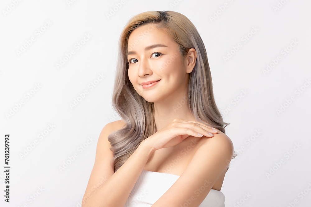 Portrait of a beautiful young woman with radiant skin and sleek hair, posing with a confident smile. Facial treatment, Perfect skin, Natural make up. Isolated on white background. Portrait of a beautiful young woman with radiant skin and sleek hair, posing with a confident smile. Facial treatment, Perfect skin, Natural make up. Isolated on white background.