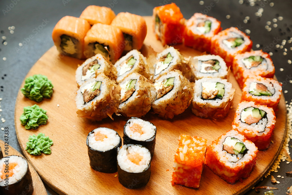 Abundant Sushi Platter on a Wooden Plate Abundant Sushi Platter on a Wooden Plate