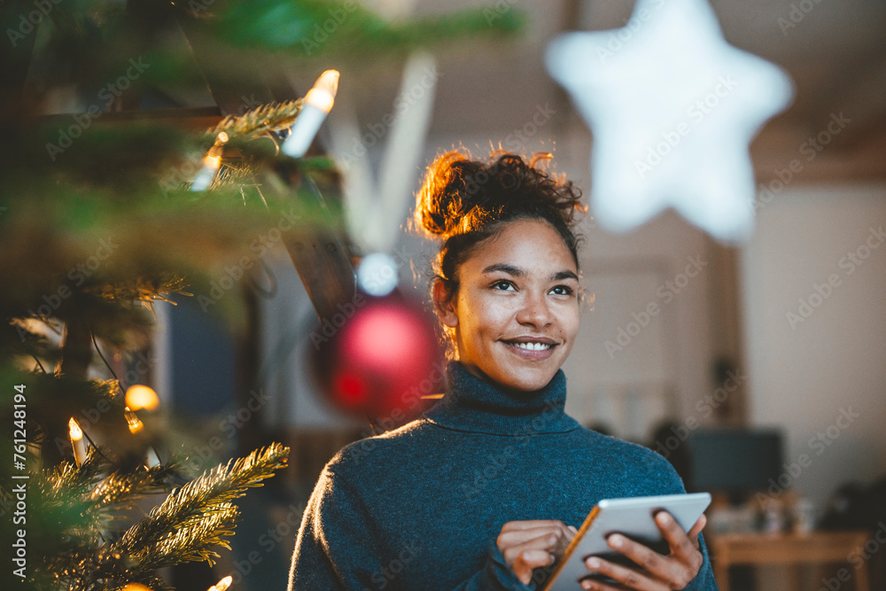 © Westend61 - Contemplative woman with tablet computer at home © Westend61 - Contemplative woman with tablet computer at home