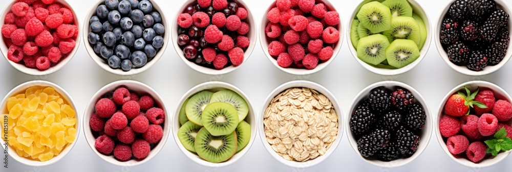 Assorted berries, fruits and oatmeal on white background, top view healthy snacking concept Assorted berries, fruits and oatmeal on white background, top view healthy snacking concept