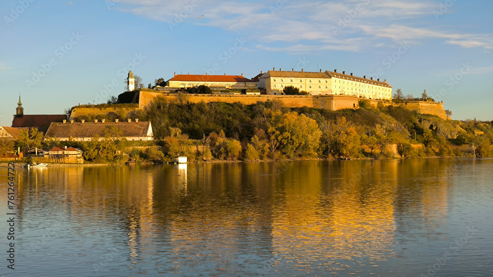 Petrovaradin Fortress by the Danube river in bright autumn day