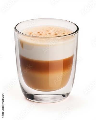 A cup of latte in a thick-walled glass.