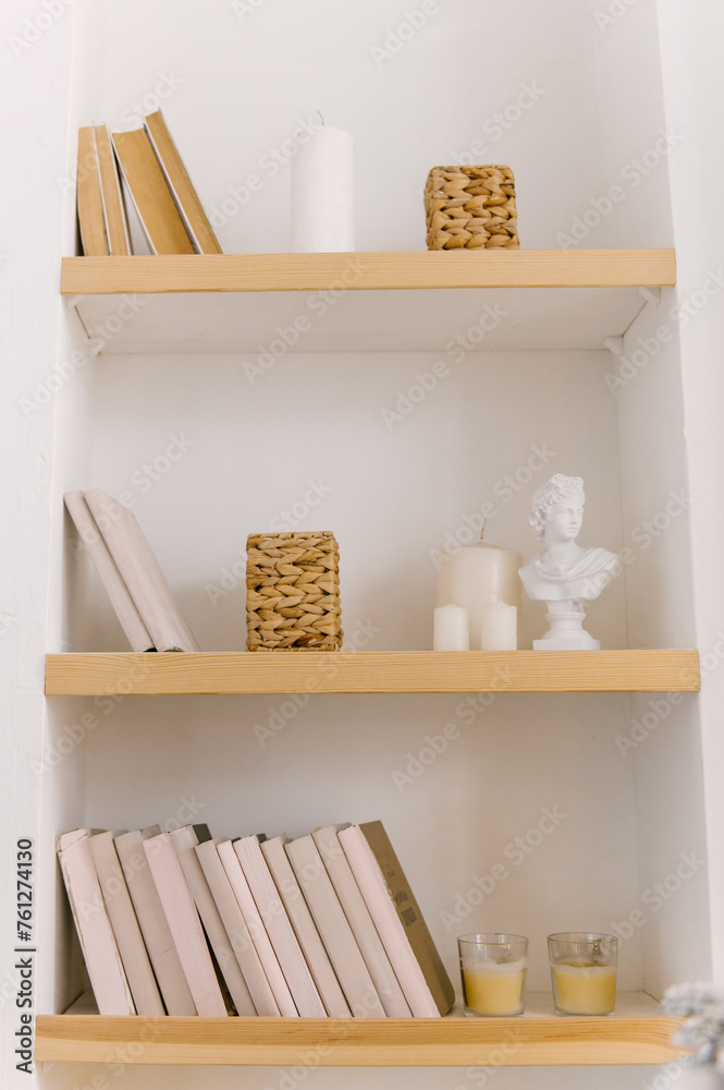 Beautiful minimalistic interior, bookshelf and decor