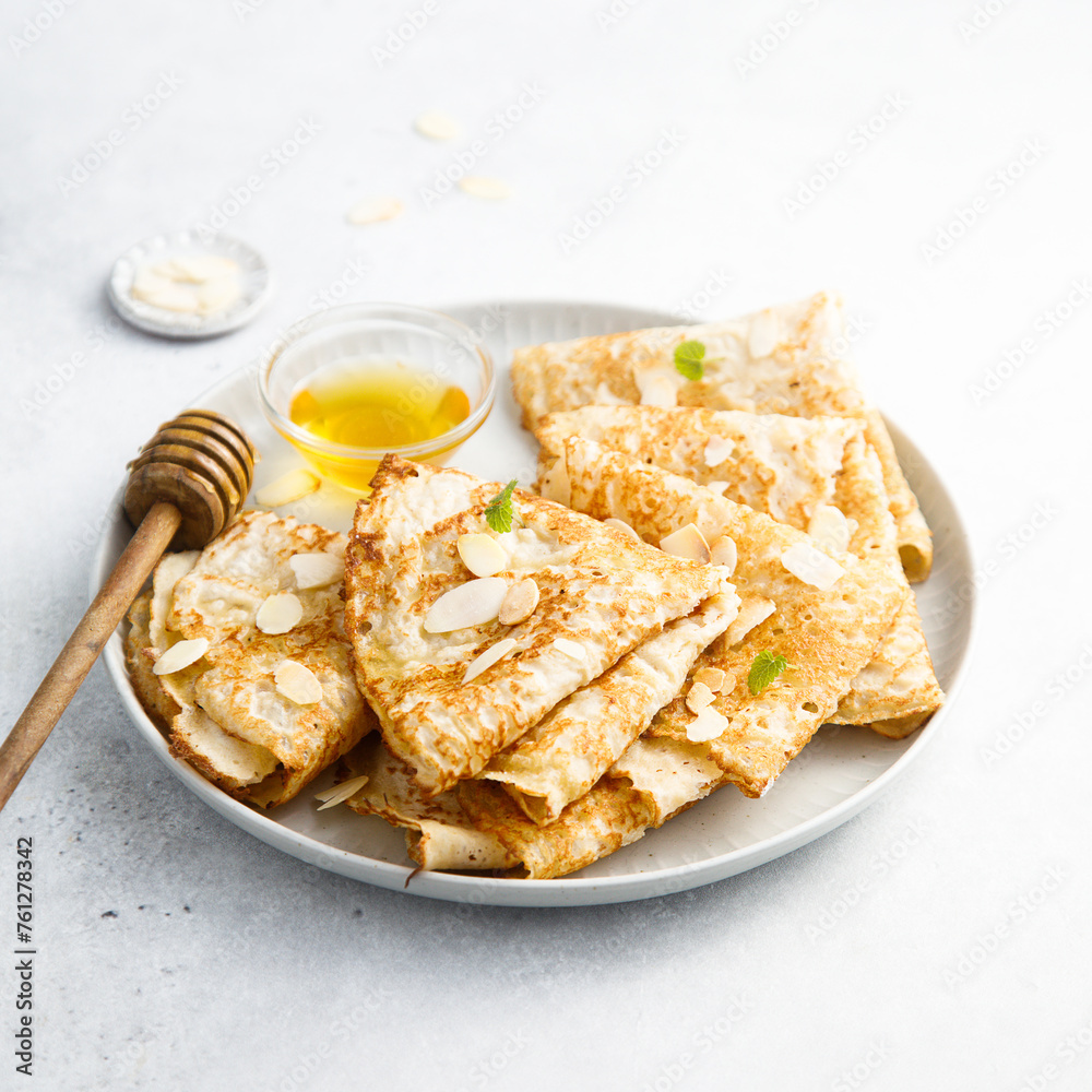 Homemade crepes with almond and honey Homemade crepes with almond and honey