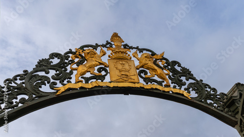 St. Petersburg, Russia, February 10, 2023. The ancient coat of arms of the Sheremetyev family on the fence of the palace. photo