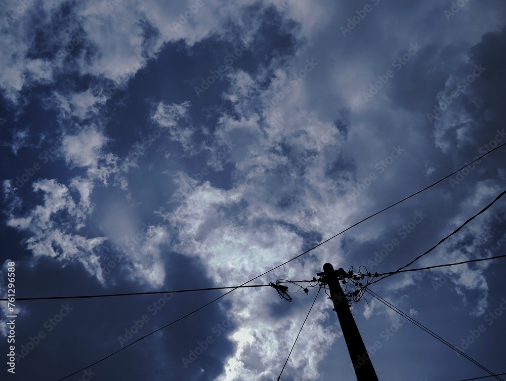 Silhouette of electric pole under the sky Silhouette of electric pole under the sky