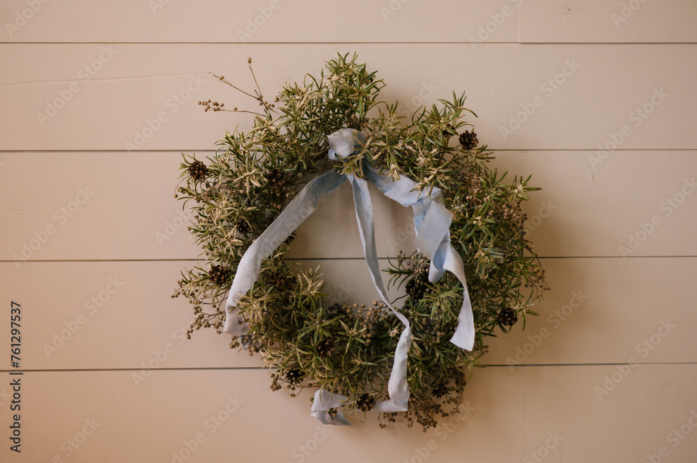New Year wreaths with lights on a wooden wall background, New Year decor