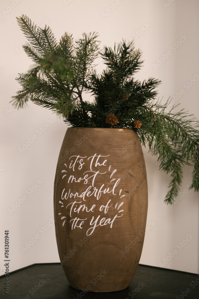 Bucket vase with fir branches, Christmas decor