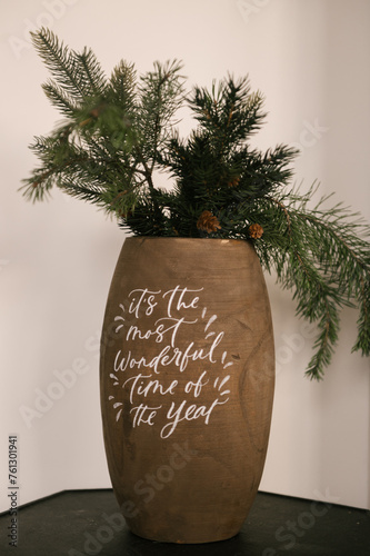 Bucket vase with fir branches, Christmas decor