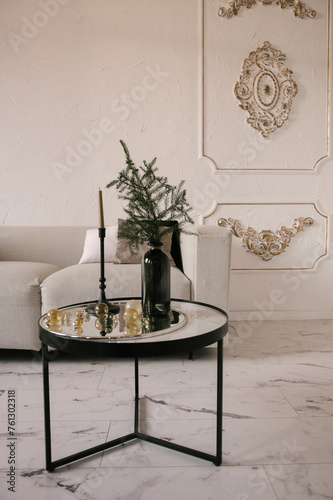 Obraz na płótnie Stylish modern classic interior with sofa, table and stucco walls w salonie