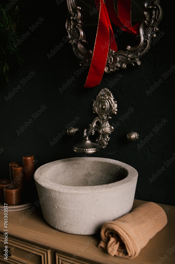 Stylish modern japandi interior, concrete sink with vintage faucets and mirror