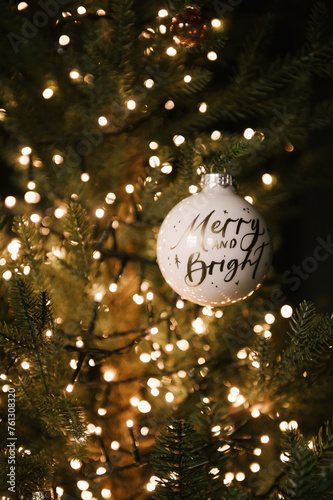Obraz na płótnie Beautiful New Year decor, Christmas tree in the stylish dark interior of the living room w salonie