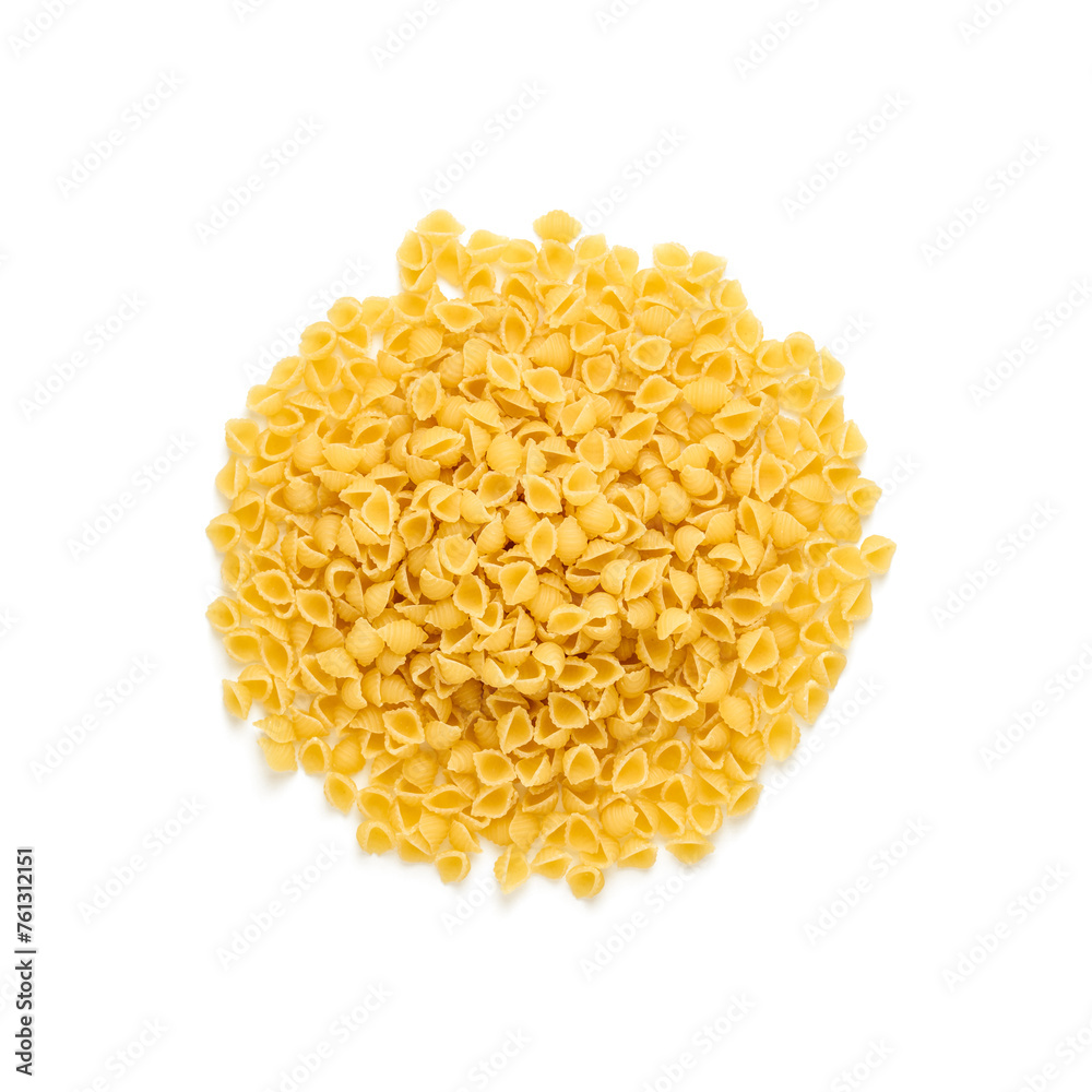 Italian pasta conchiglie on white table. Italian food background. Top view, directly above. Italian pasta conchiglie on white table. Italian food background. Top view, directly above.