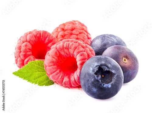 Raspberries with blueberries  Isolated on White Background. Ripe berries closeup.