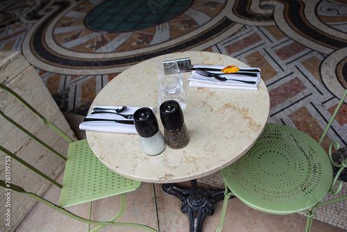Bistro table in a mosaic room