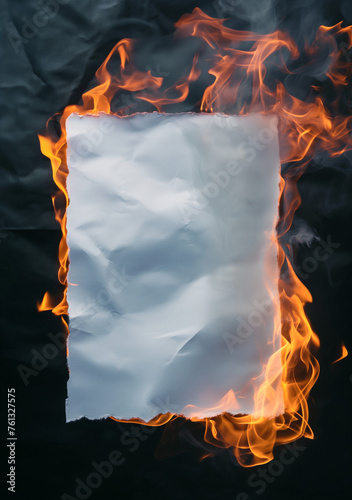 White blank paper sheet on fire, burning