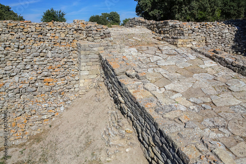 Ancient troy (Troja). Southwest ramp of Troy II - the main entrance to citadel of ancient Troy. Hisarlik hill. Tevfikiye (Cankkale), Turkey (Turkiye) photo