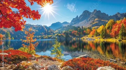 Vibrant high tatra lake at autumn sunrise with mountains and pine forest reflections