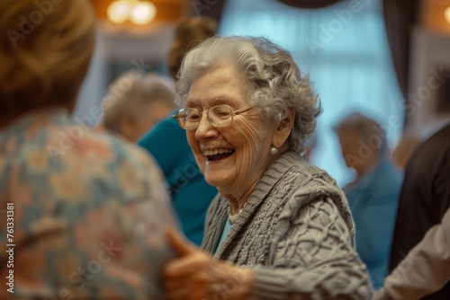 An older woman with a smile, engaging in conversation with a group of people in a lively social gathering