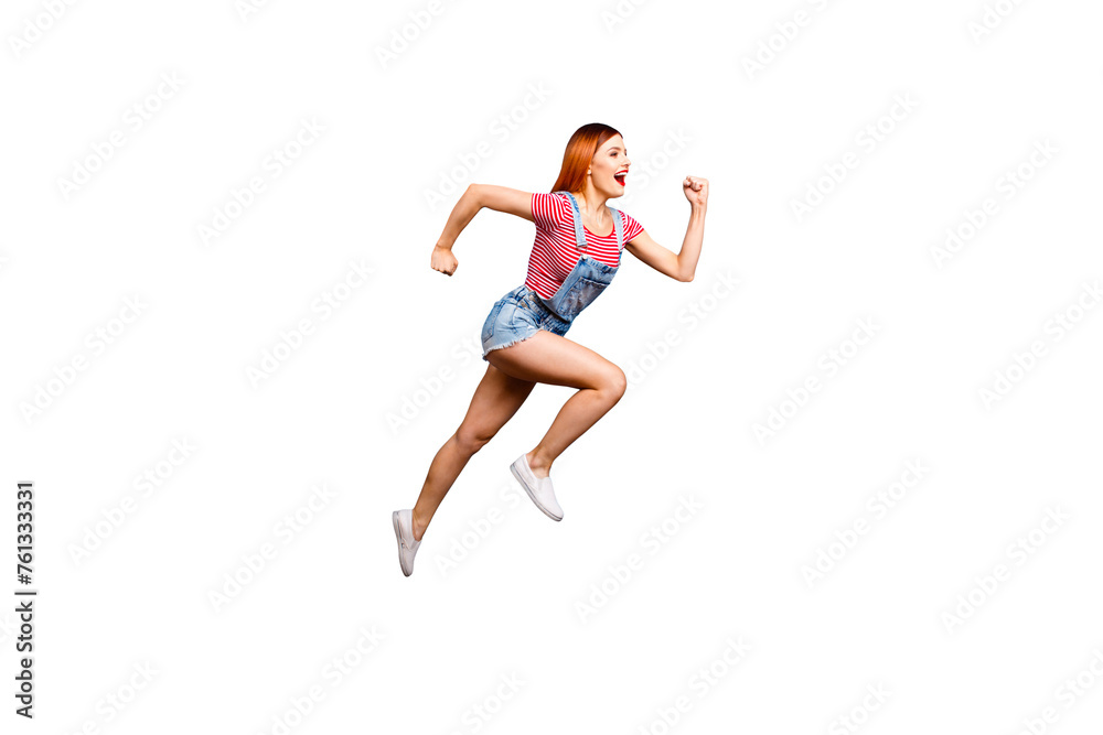 Full-size portrait of running marathon girl who looks in front of her isolated on bright blue background