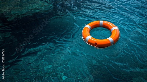 Orange life preserver floating in clear blue water, symbol of safety and security in aquatic environment