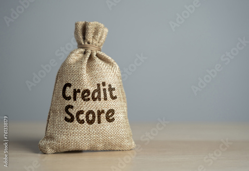 Bag with credit score. High costs, expensive loan servicing, low credit rating. Seeking advice, budgeting consciously, and exploring debt management options, regaining financial stability. photo