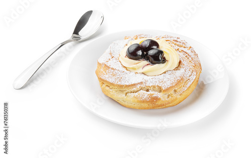 Zeppola di San Giuseppe, Italian dessert with plate and teaspoon isolated on white background, close-up.