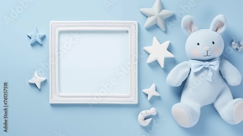 Soft bunny plush with square frame mock up. Charming toy blue. Decorative stars for nursery pictureframe mockup with blank space. Babyhood concept composition top view, border picture
