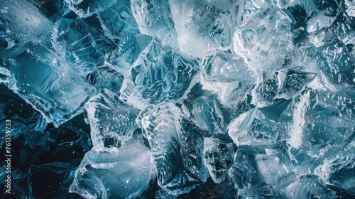 "Ice textures close-up. Macro photography of natural ice patterns. Abstract nature background. Design for wallpaper, print, or backdrop." © LOMOSONIC