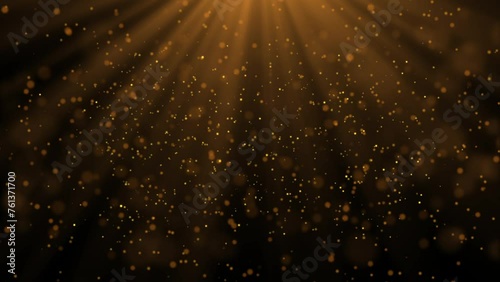 Gold particles abstract background dust bokeh glitter.