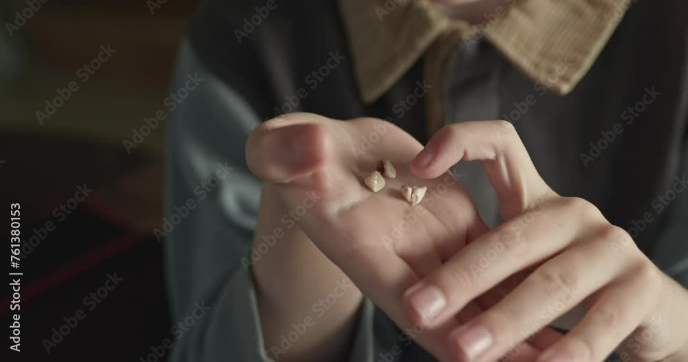 Child Counts Fallen Out Milk Teeth with Hand Fingers. Kid Boy Shows Lost Baby Tooth. Slow motion 4K 10-bit Child Counts Fallen Out Milk Teeth with Hand Fingers. Kid Boy Shows Lost Baby Tooth. Slow motion 4K 10-bit