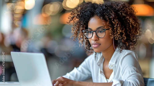 Woman Wearing Glasses Using Laptop Computer