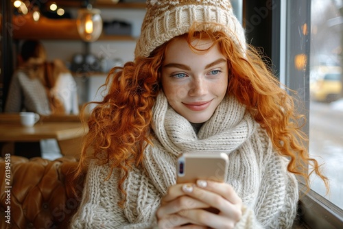Woman Sitting at Table With Cell Phone