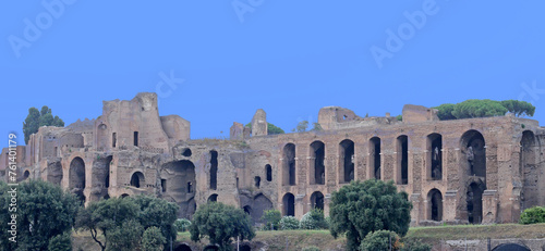 Ruines of the 3th century Caracalla Thermen with blue sky in Rome, Italy photo