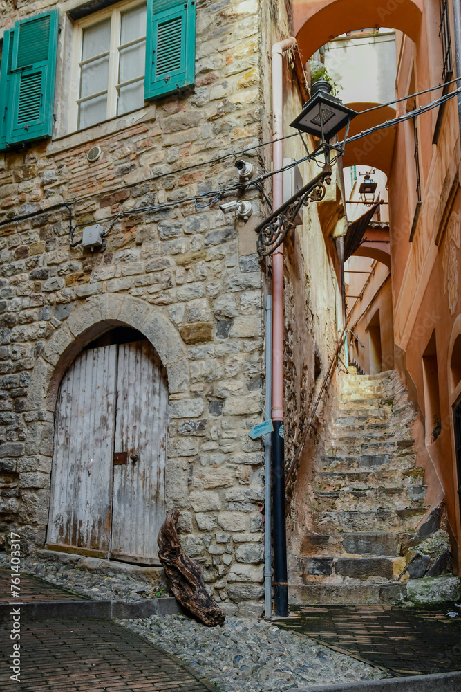 Uphill alley and stone staircase in the medieval town, called 