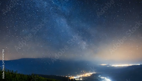 starry night sky,As darkness falls, the island is bathed in the soft glow of moonlight, casting ethereal shadows across its rugged terrain. T © Fuloos 