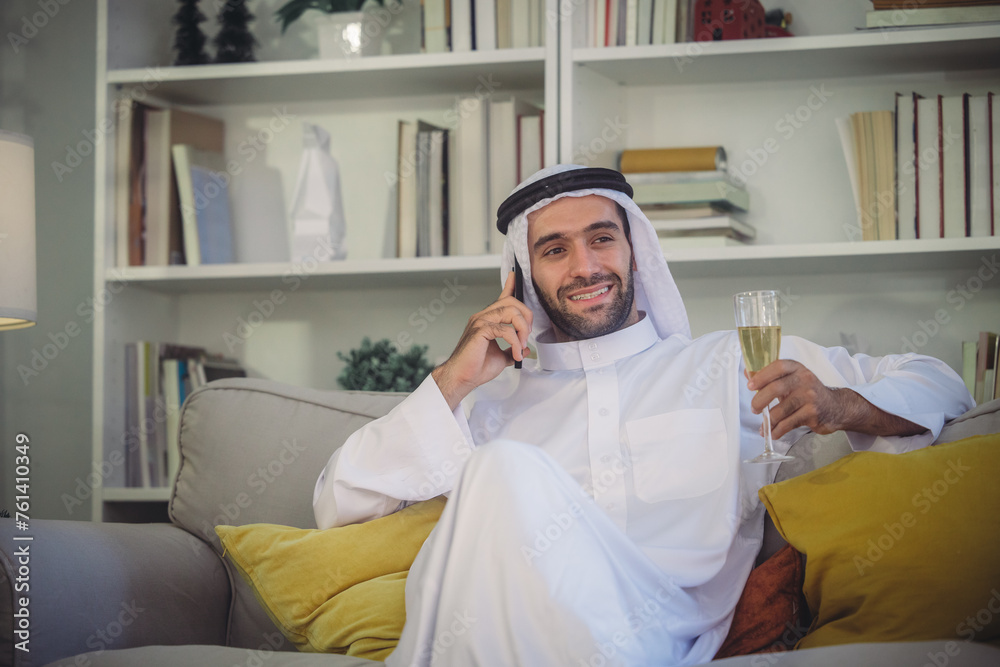 The smiling Sheikh CEO remotely leads the team and oversees business operations via video call. The smiling Sheikh CEO remotely leads the team and oversees business operations via video call.