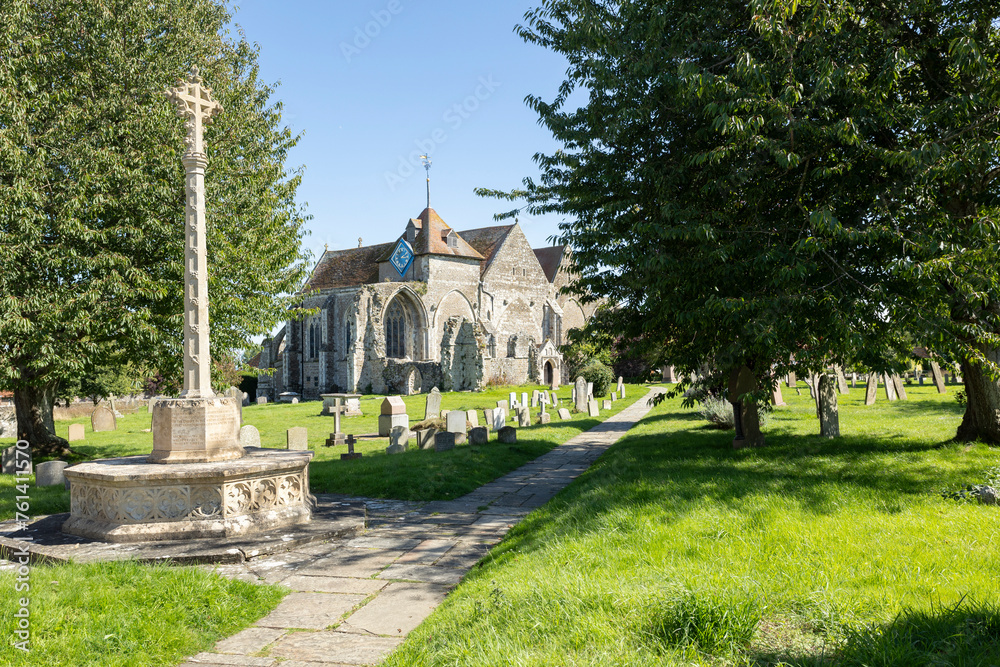  War memorial and St Thomas the Martyr Church at Winchelsea, East Sussex, UK