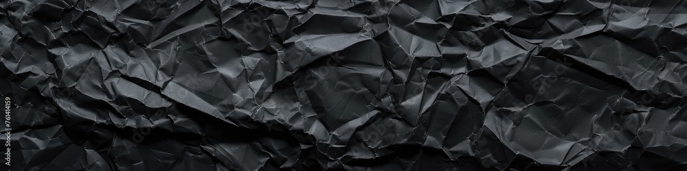 Uncover the allure of a single-colored crumpled paper texture background, rendered in deep black, offering a timeless elegance to your designs. - obrazy, fototapety, plakaty 
