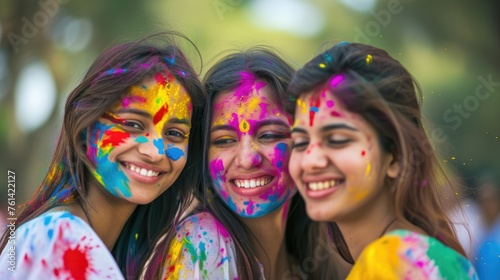 Three Friends Celebrating Holi Festival with Colored Paint and Smiles. Fictional character created by Generated AI. 